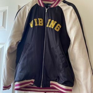 “Vibing” varsity jacket